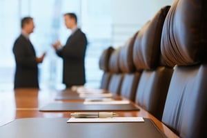 Executives talking in conference room