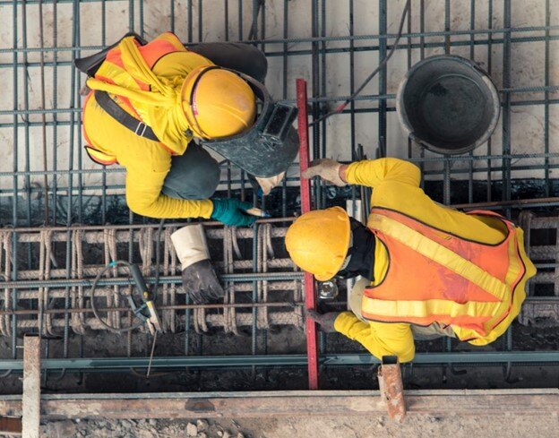 Construction workers working at their job site