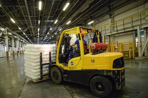 Person driving forklift