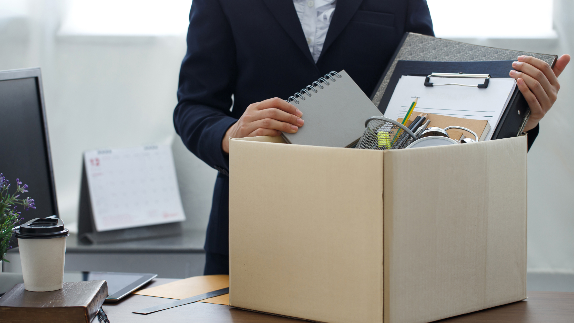 Employee packing up their desk