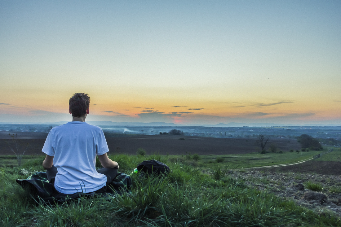 Man sitting in field