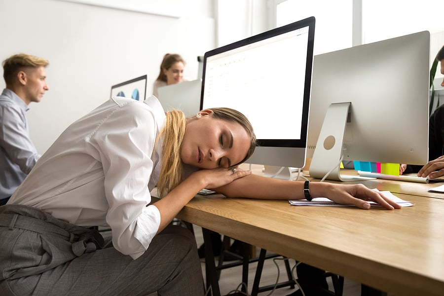 Employee sleeping at desk